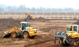 Планировка участка бульдозером в Волхове от 950 руб. Цены за м2 - ГОСТСТРОЙ