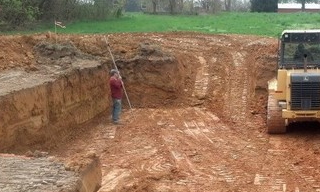 Выкопать котлован под фундамент в Волхове - от 2637 руб. | ГОСТСТРОЙ